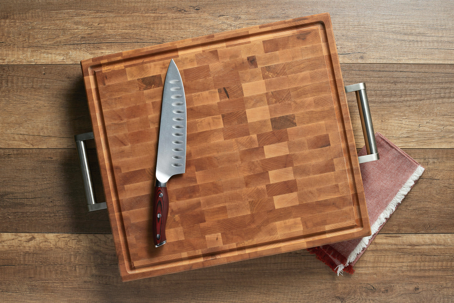 Butcher block with stainless steel handles and wooden legs (16 x 18 x 2 in)