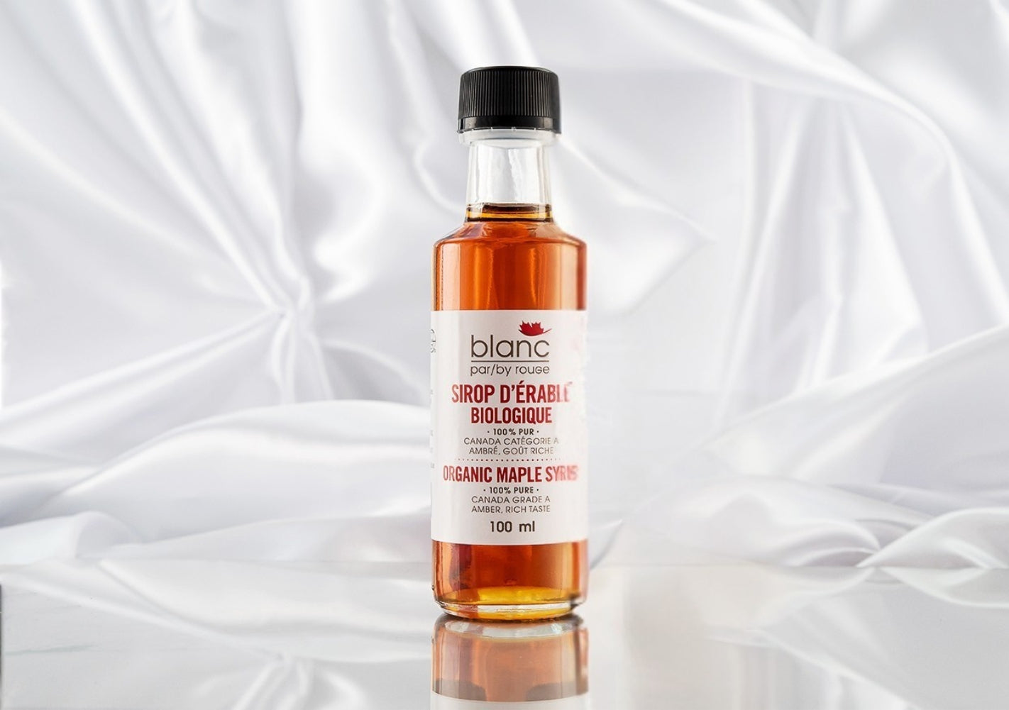 100% pure and organic maple syrup in its container